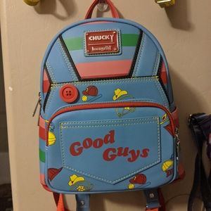 RARE child's play chucky loungefly mini backpack. One button manufacturer flaw